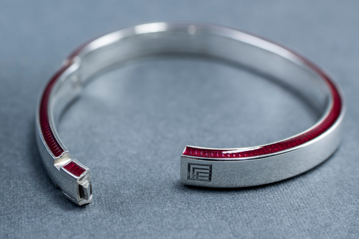 Captivating Harmony: Solar Eclipse-Inspired Bracelet with Rich Red Enamel in Minimalist Design