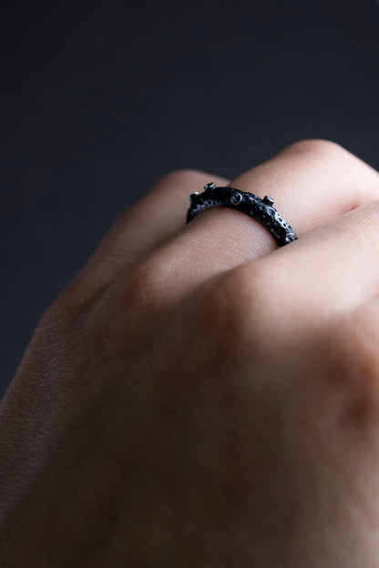 Moon Surface Textured Silver Ring with Blue Topaz